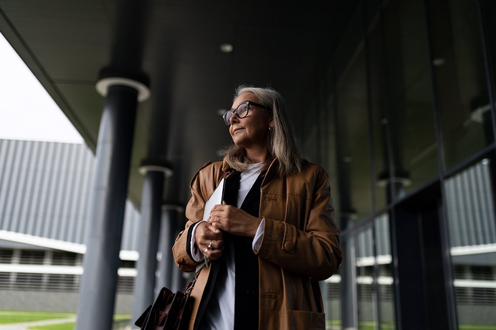 woman outside thinking about menopause